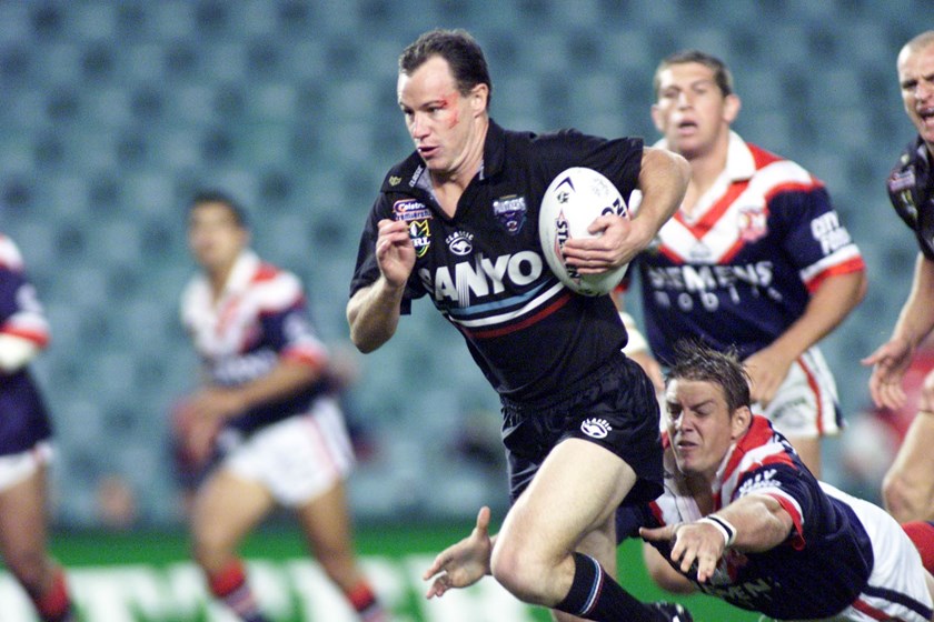 Justin Holbrook makes a break for Penrith in 2001.