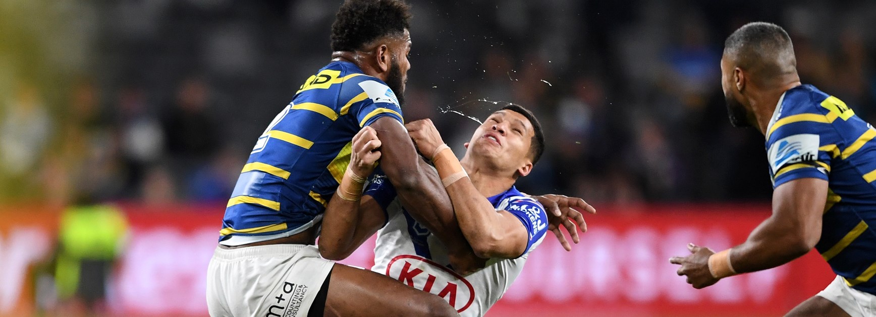 Bulldogs fullback Dallin Watene-Zelezniak is cleaned up by Maika Sivo.