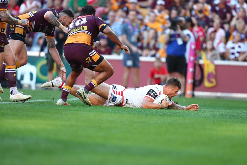 Tariq Sims scores against Brisbane in the opening week of the 2018 finals series.