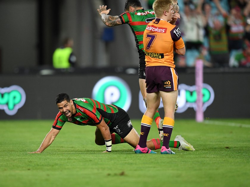 Cody Walker celebrates a try against the Broncos in round 8.