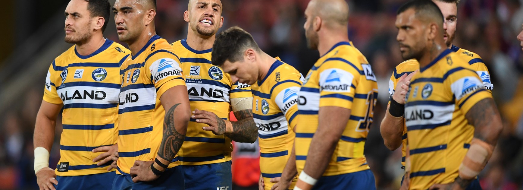 The dejected Eels after losing to Melbourne.