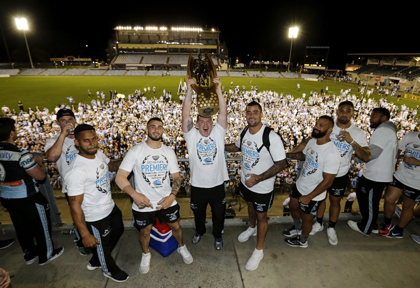 Sharks players celebrate their grand final win in 2016.