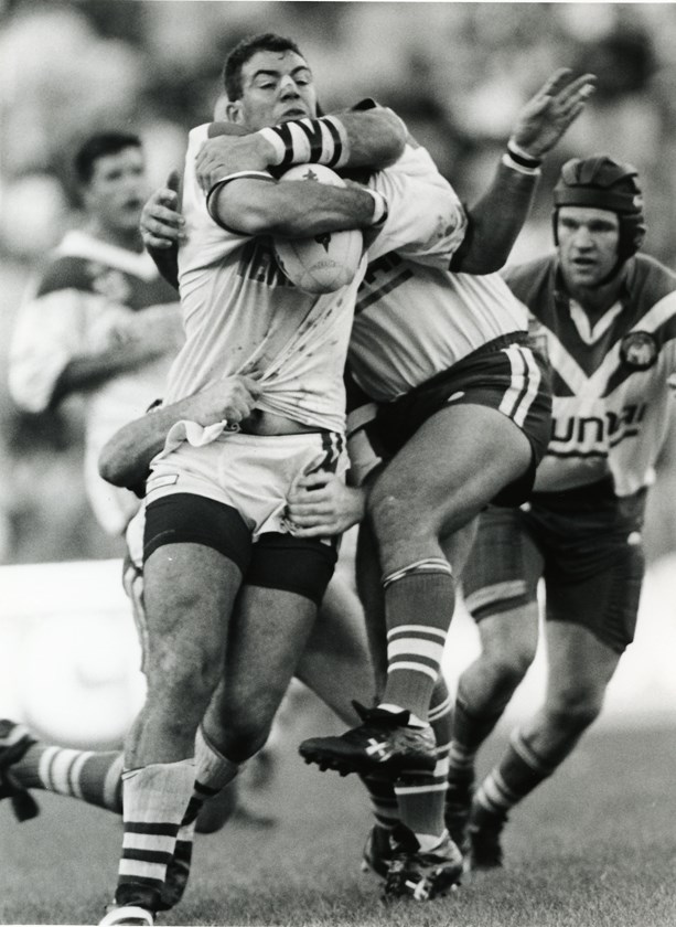 Two Canterbury players wrap up Tony Priddle.
