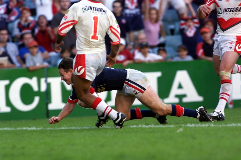 Justin Holbrook scores a try for the Roosters against St George Illawarra on Anzac Day in 2002.