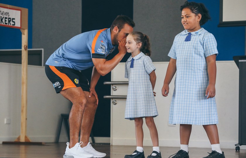Wests Tigers half-back Luke Brooks spreading positive messages to school students.