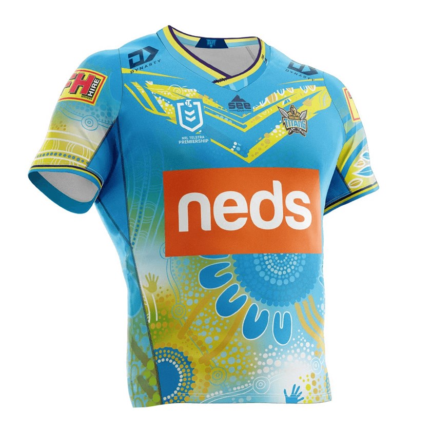 Gold Coast's Indigenous Round jersey. 
Connection with community, passion, support and togetherness are the key messages from the inspiring artwork “Healing” from Coffs Harbour artist Laura Pitt, that has been chosen as the design for the Gold Coast Titans 2020 Indigenous jersey. The blue circles in the middle with the symbols on the outside represent the Titans community, passion is represented through the coloured dots surrounding the players and supporters with links of the blue and ochre lines that merge together as one.
The handprints and blue and white waterholes surrounding the area represent connection to the land. The blue and yellow healing leaves represent the resilience of the team that play together and heal together.
