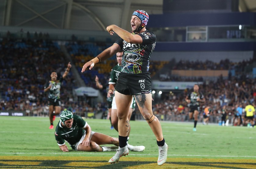 Indigenous All Star Josh Curran celebrates a try.