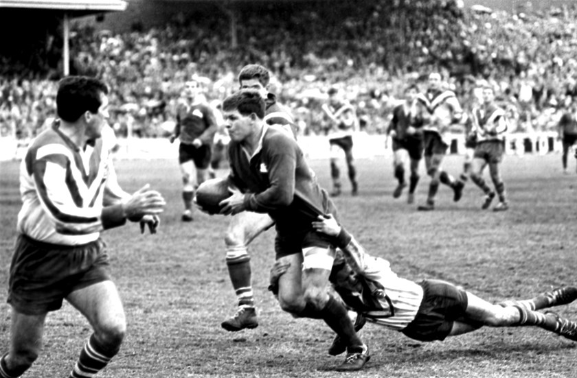Bob McCarthy tries to break the Canterbury defence in the 1967 grand final.