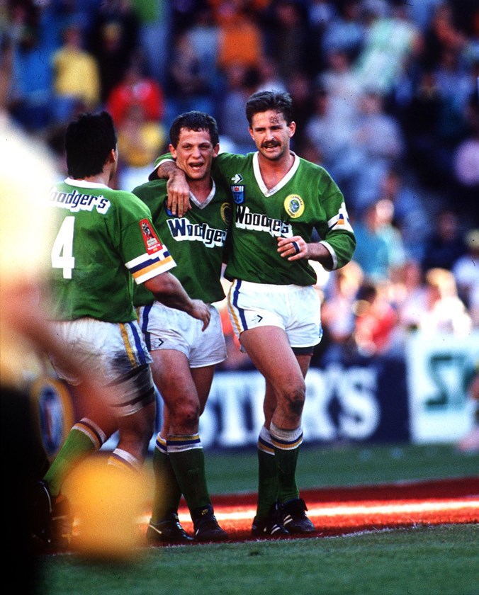 Laurie Daley, Steve Walters and Gary Belcher celebrate Canberra's 1989 grand final win.