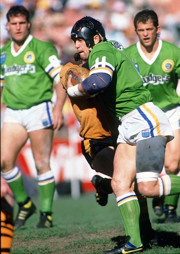Dean Lance charges into the Tigers in the 1989 grand final.