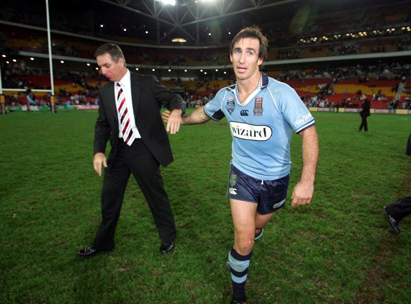 Newcastle club comrades Michael Hagan and Andrew Johns were on opposite sides of the state divide in 2005.