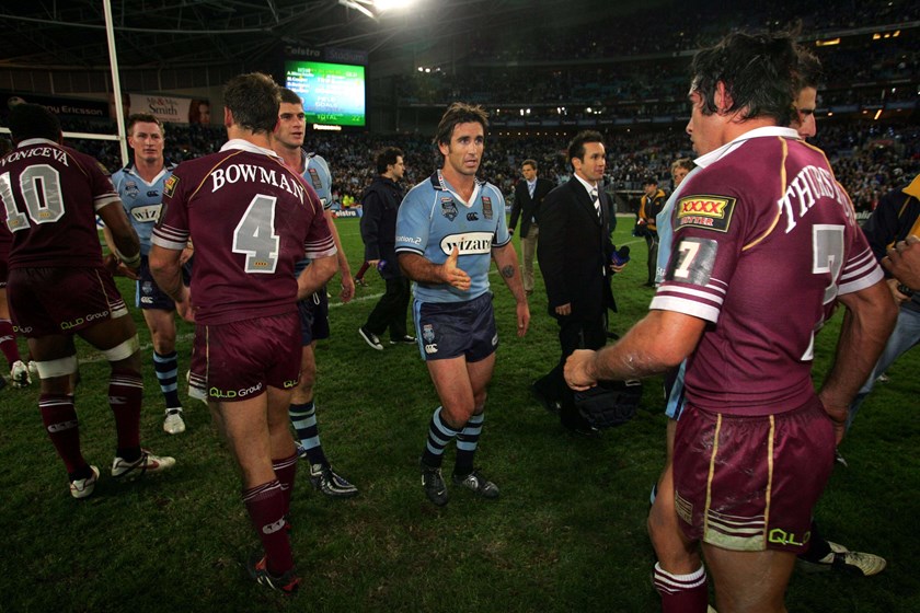 Rival halfbacks Andrew Johns and Johnathan Thurston after Origin II in 2005.