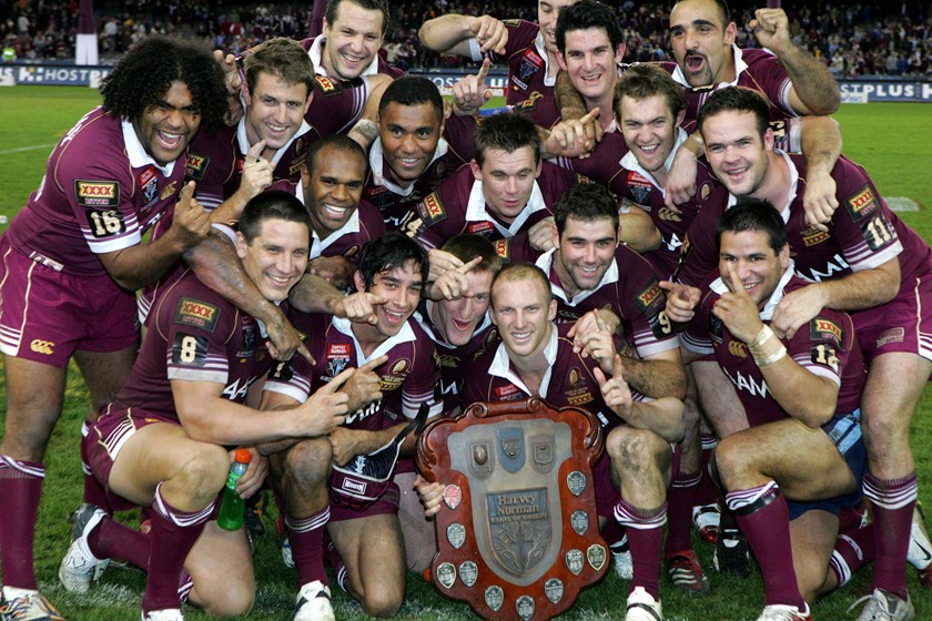 The Maroons are jubilant in Melbourne after reclaiming the Origin shield in 2006.
