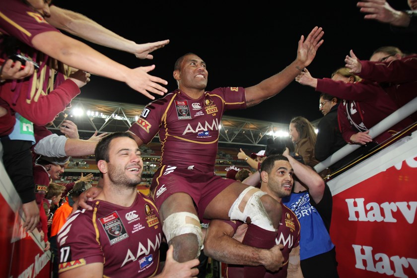 Petero Civoniceva is chaired from the field after his last Origin in 2012.