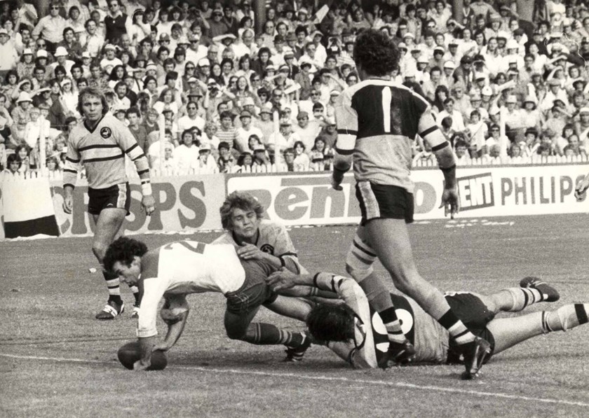 Chris Anderson scores a try against Cronulla.