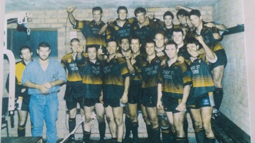 Brad Arthur, fifth from the right in the front row, with the Batemans Bay Tigers in the late 1990s. Future Knights coach Adam O'Brien is on the far right.