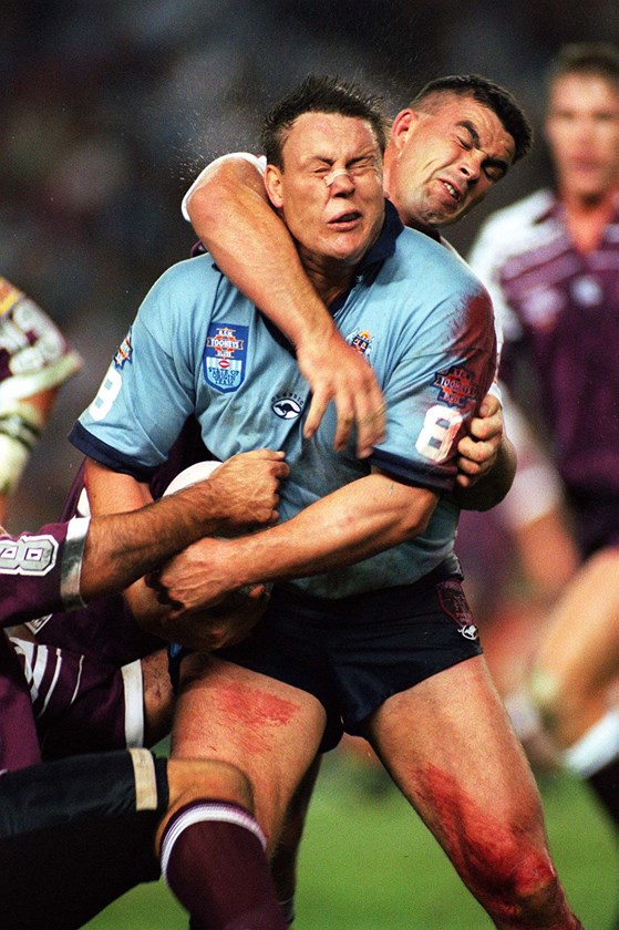 Glenn Lazarus is tackled by Broncos teammate Andrew Gee during the 1996 State of Origin series.