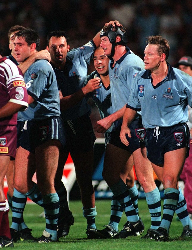 Blues forward Steven Menzies is congratulated after scoring in the 1996 series.