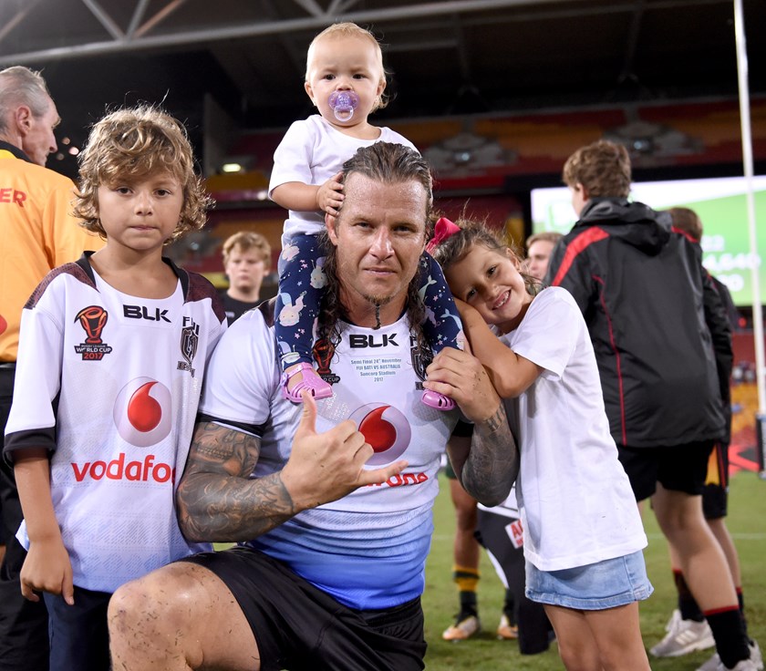 Ashton Sims with his kids after representing Fiji in 2017 at the World Cup.