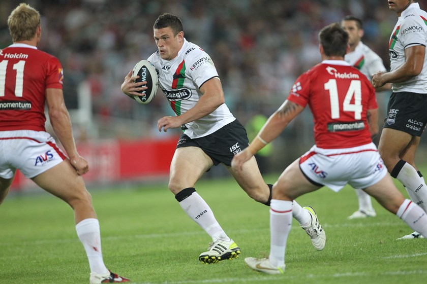 Luke Burgess powers ahead before injuring his foot in the 2012 Charity Shield.