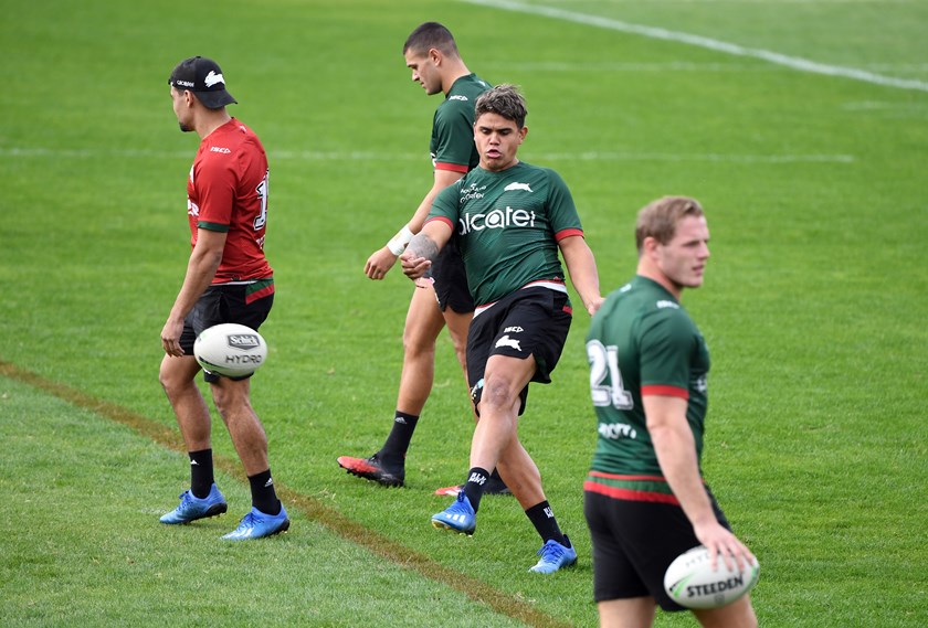 Latrell Mitchell practises kicking at Souths training on Wednesday.