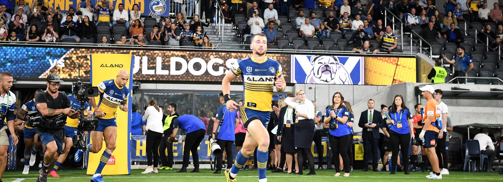 Clint Gutherson leads the Eels onto the field.