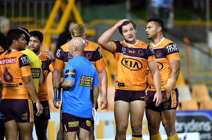 Stand-in skipper Patrick Carrigan shows the strain after Brisbane concede yet another Tigers try.