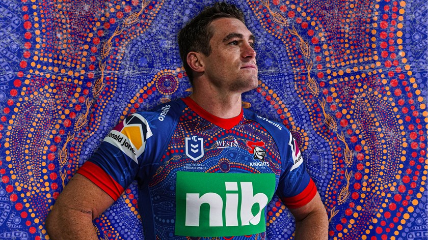 The Newcastle jersey was designed by local Aboriginal artist Tyler Smith with feedback from Knights players Connor Watson, Edrick Lee and Gehamat Shibasaki. In creating a deeper bond to the region and its people, Smith enlisted the assistance of four young Indigenous detainees through his art program at Frank Baxter Youth Justice Centre. The design of the jersey represents the local landscape of Newcastle, the wider region and also incorporates the handprints of the three players. Central to the design is the implementation of three totems representing the three players - Goanna (Watson), Turtle (Shibasaki) and Saltwater Crocodile (Lee).