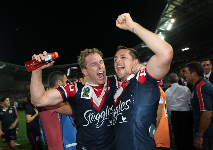 Mitchell Aubusson and Mitchell Pearce after the 2013 grand final.
