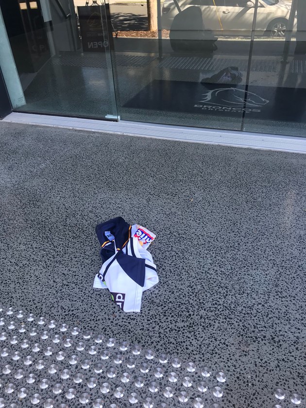 The Broncos jersey tossed at the front door of the club's headquarters.