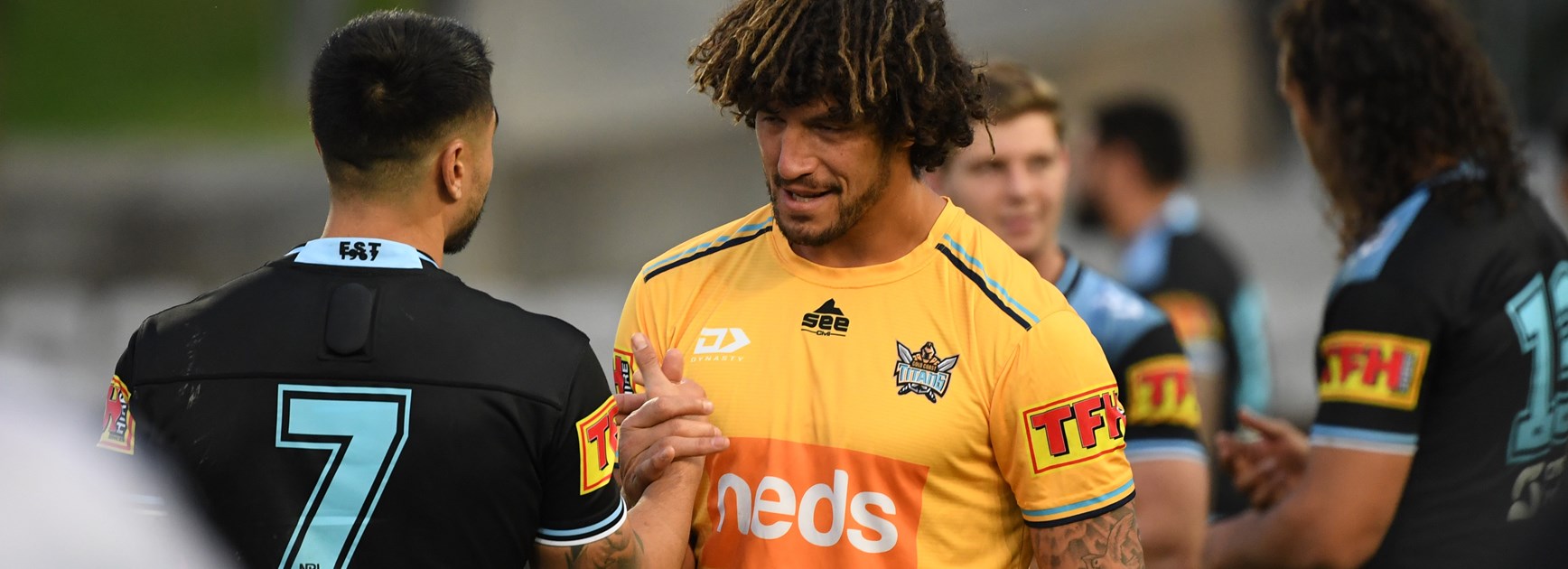 Shaun Johnson and Kevin Proctor shake hands after the game.