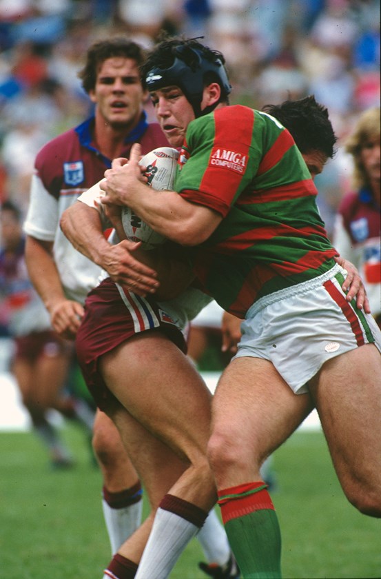 Mark 'Spudd' Carroll makes a fearsome sight as he powers ahead for Souths.
