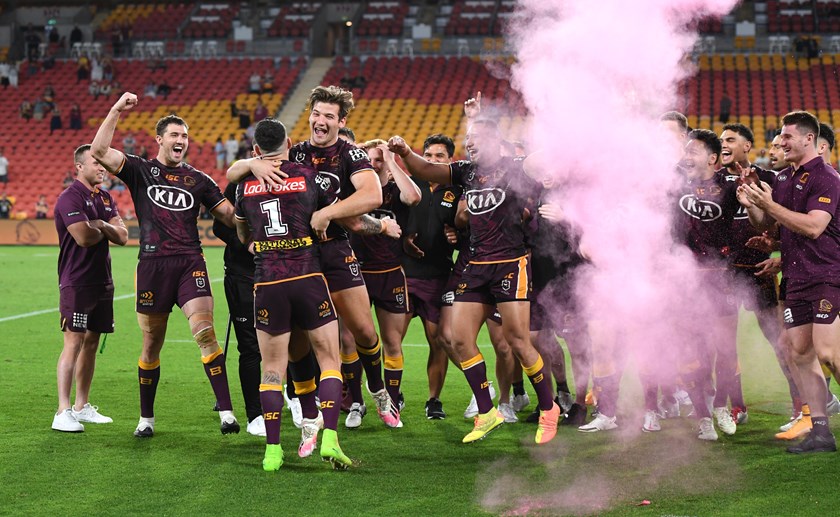 Moments after the Broncos finished with the wooden spoon, teammates swamp Darius Boyd after his on-field gender reveal for his third child on the way.