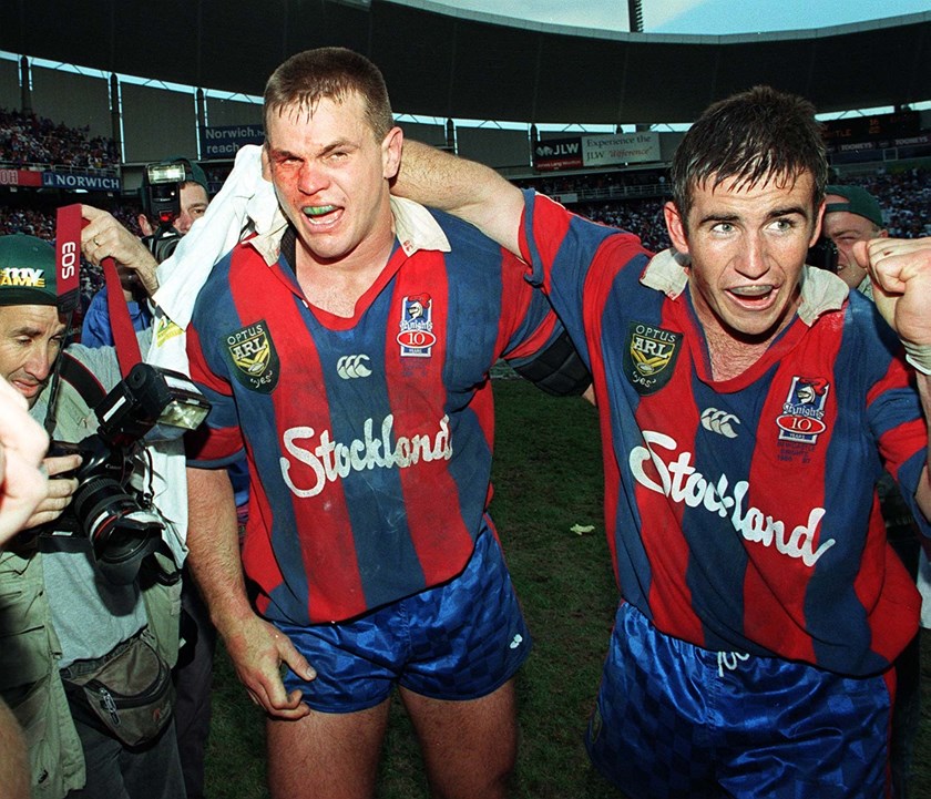 Paul Harragon and Andrew Johns celebrate the Knights' first premiership.