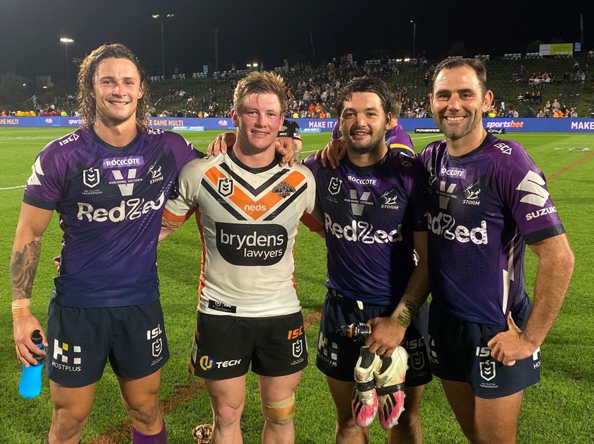 Storm hookers Brandon Smith and Cameron Smith with on-loan Tiger Harry Grant and Nicho Hynes after the round 19 clash at Sunshine Coast Stadium.