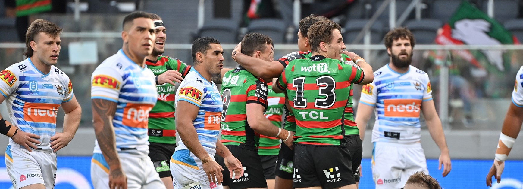 The Rabbitohs celebrate a Latrell Mitchell try against the Titans.