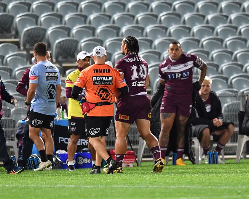 Manly prop Martin Taupau leaves the field injured in round 5.