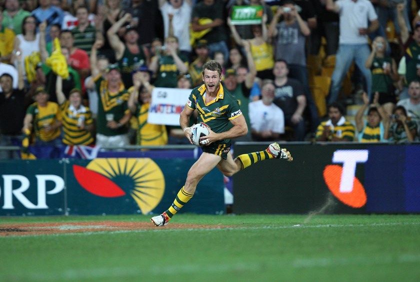 David Williams scores a try for Australia in 2008.