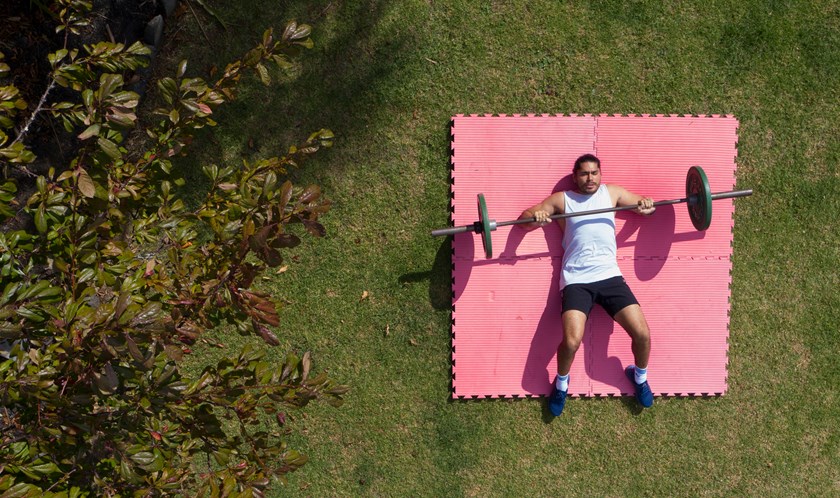 Tohu Harris working out in his backyard.