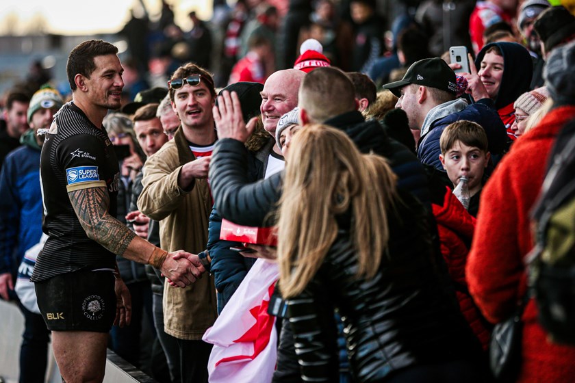 Sonny Bill Williams greets fans after a Toronto's match against Salford.