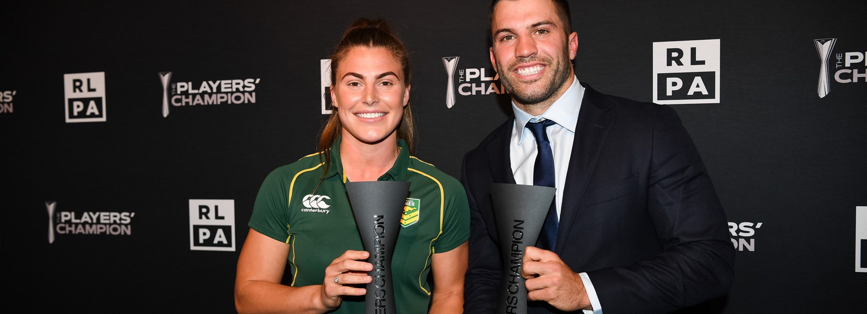 Jess Sergis and James Tedesco with their Players' Champion awards in 2019.