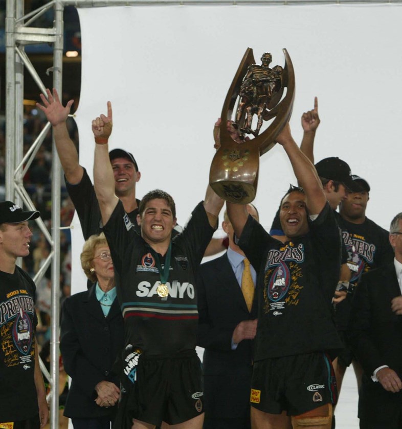 Luke Priddis enjoys the spoils of victory as Penrith capture their second title.