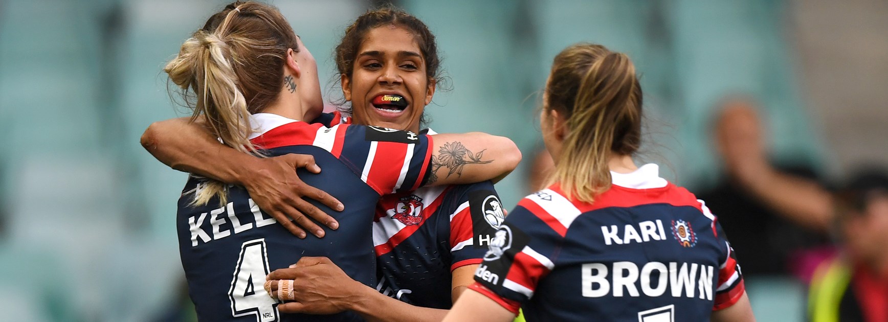 Taleena Simon celebrates a Roosters try.