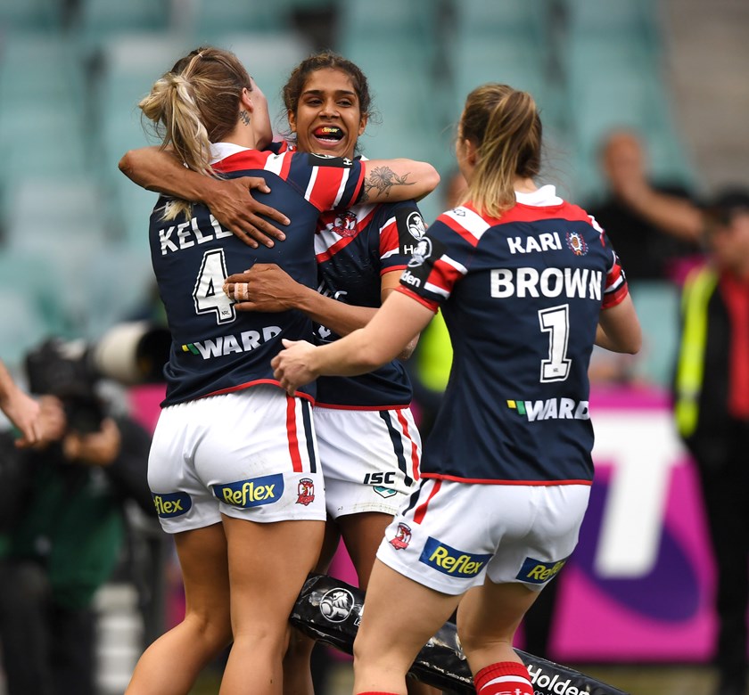 Taleena Simon celebrates a Roosters try.