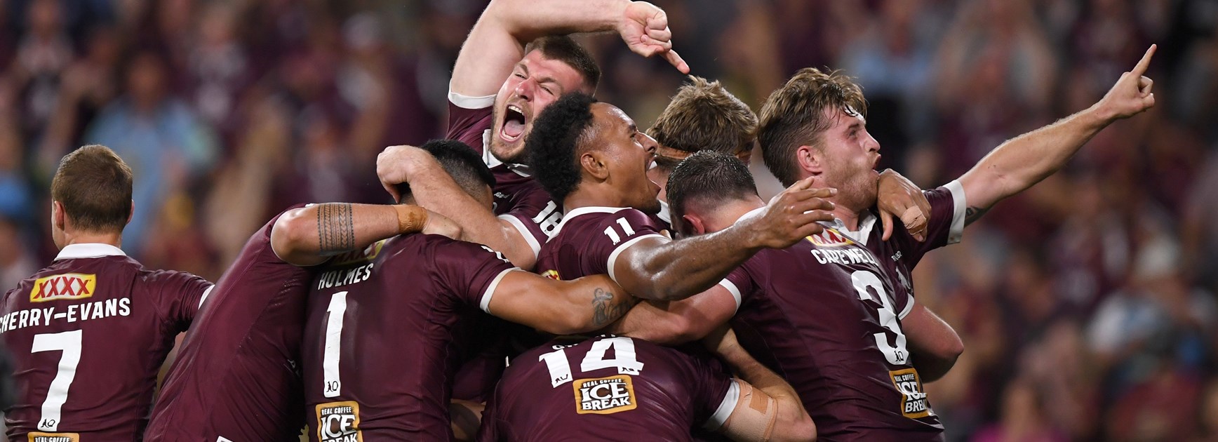Queensland players celebrate.