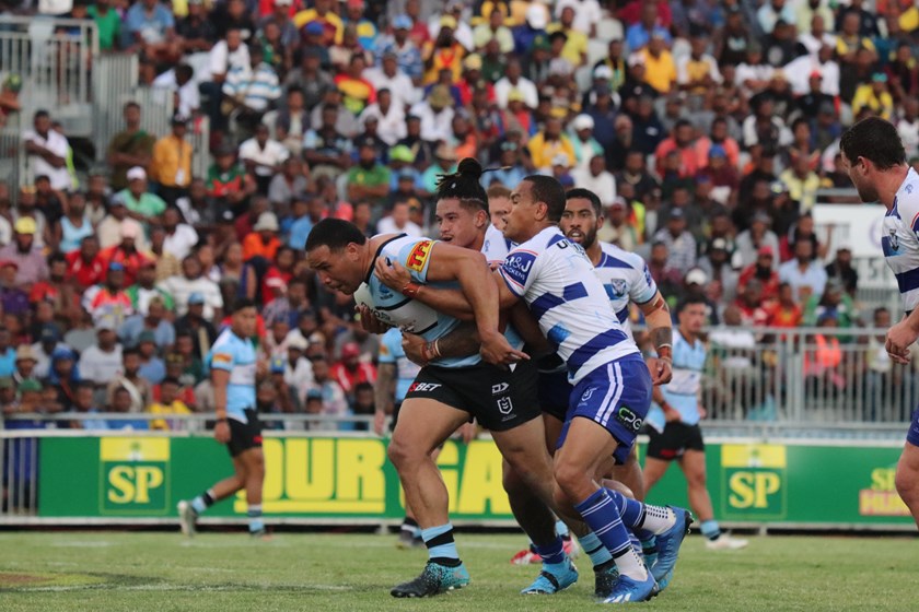 Action from the Sharks v Bulldogs trial in Papua New Guinea.