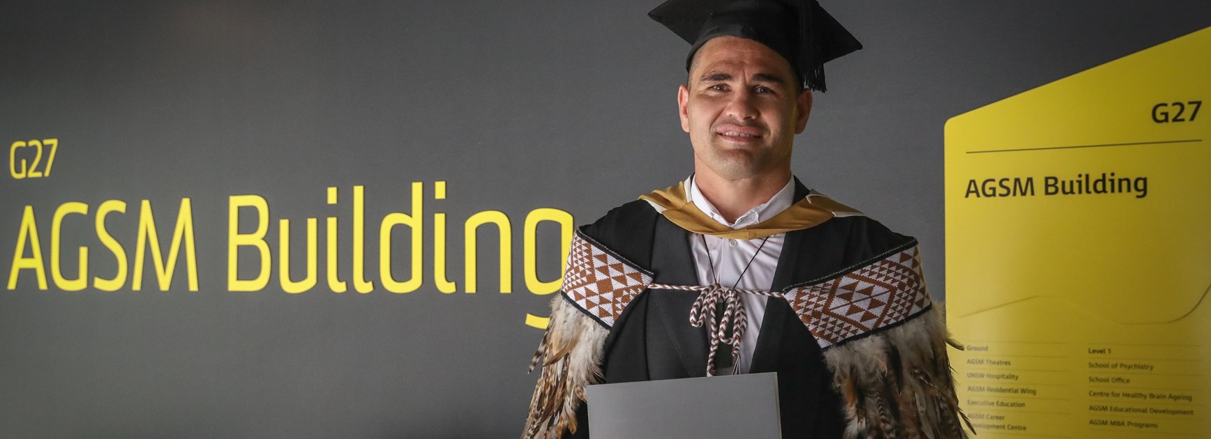 Russell Packer with his MBA.