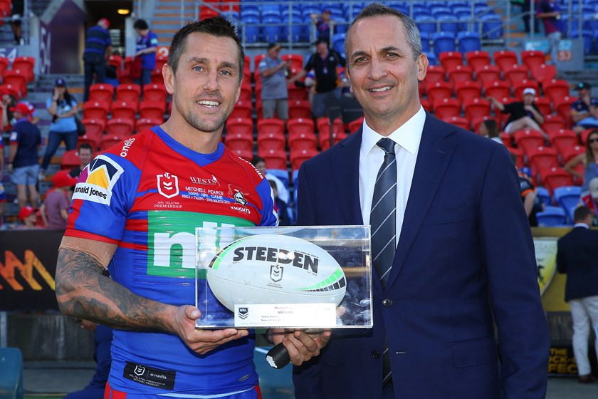 NRL CEO Andrew Abdo made a special presentation to Knights halfback Mitchell Pearce to mark his 300th NRL game.
