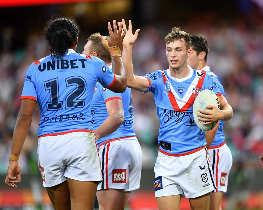 Sam Walker celebrates a try for the Roosters