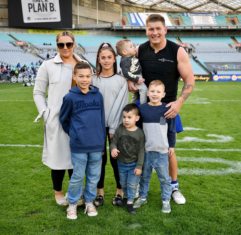 Greg Eastwood with his family after his last NRL game in 2018.